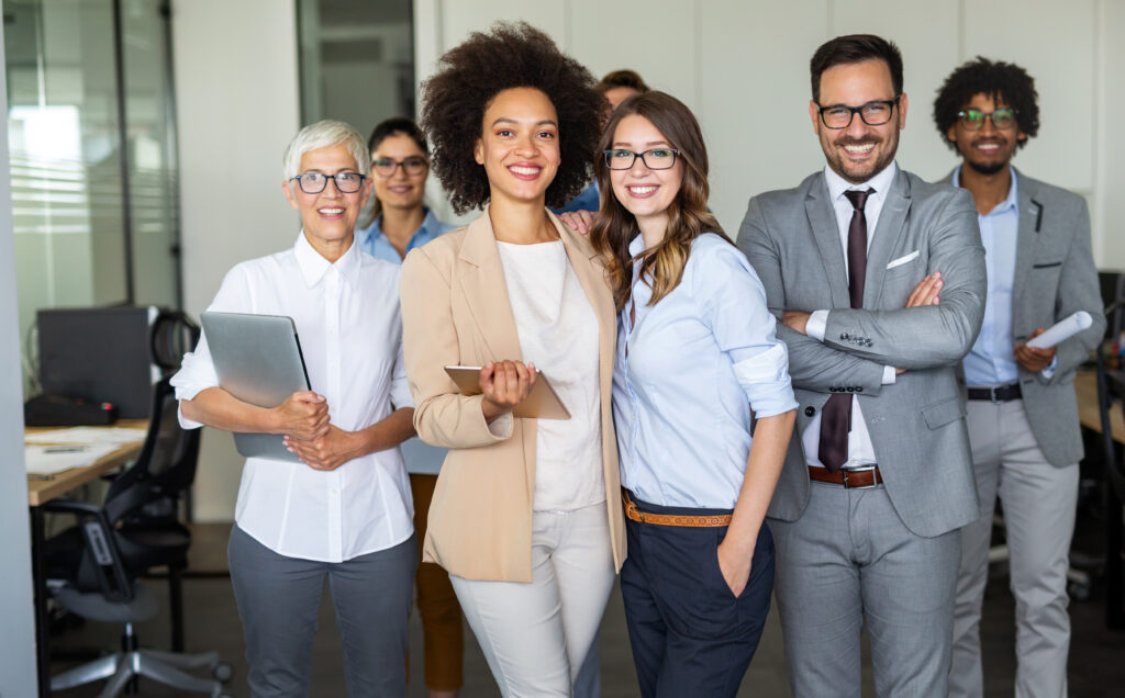 Success group of multiethnic entrepreneurs and business people achieving goals in corporate office